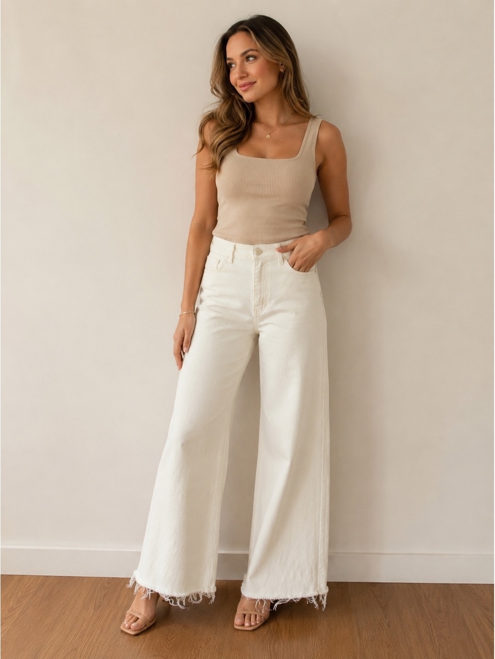 ZARA Wide-Leg White Denim Jeans with Frayed Hem.  111